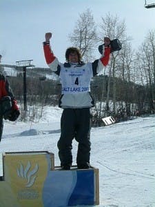 Snowboard winner on a podium
